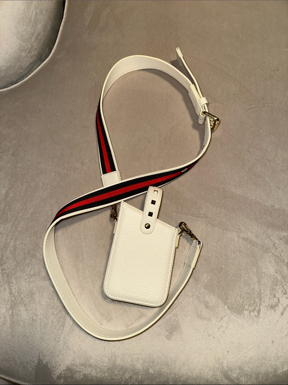 Bandolier Faux Pebble Leather Crossbody Phone Pouch with Red-Black Accent Strap